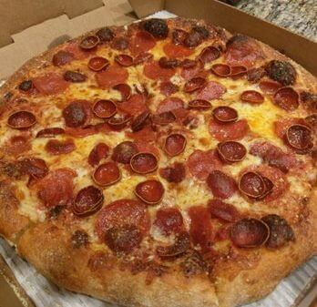 Employee at Spring Hill pizza eating place 6